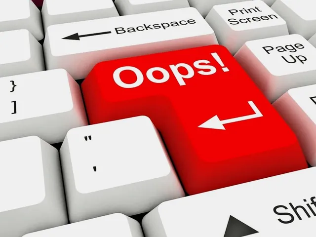 A red Oops key on a computer keyboard